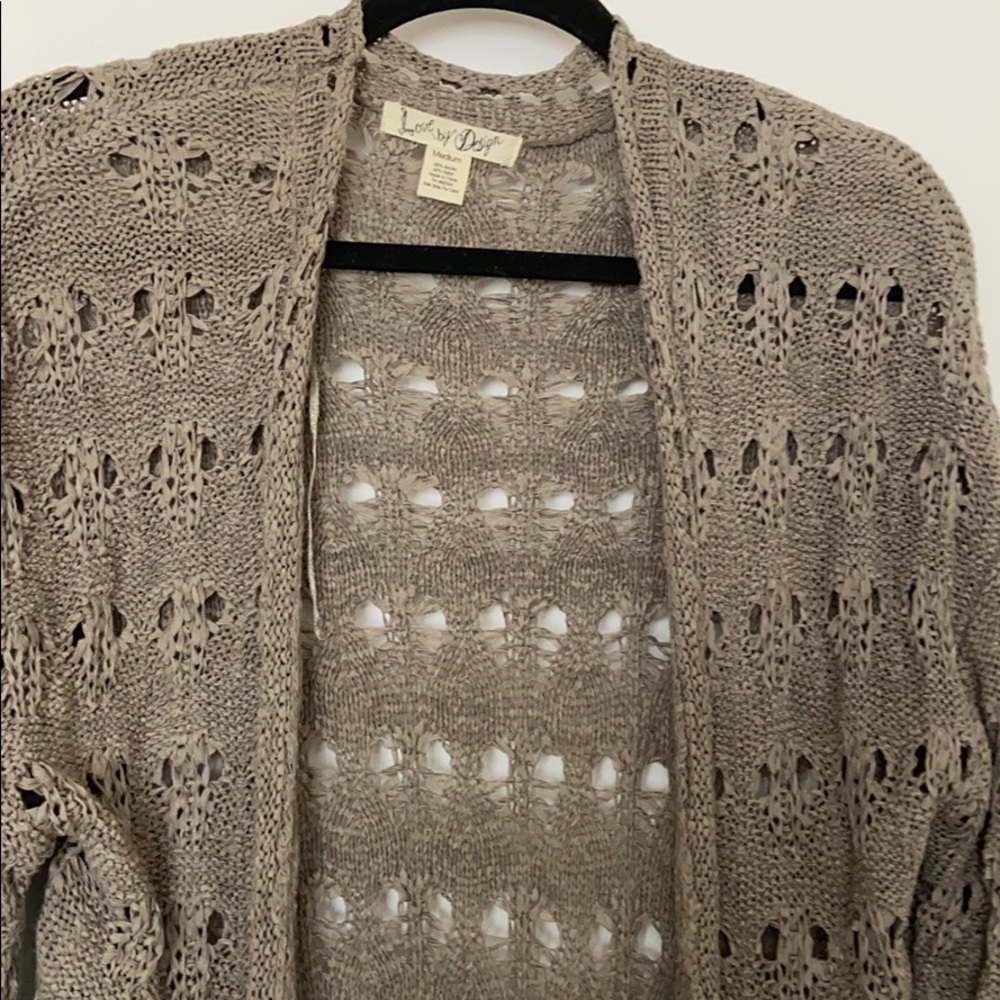 Sweater mid length w/ distressed hole design